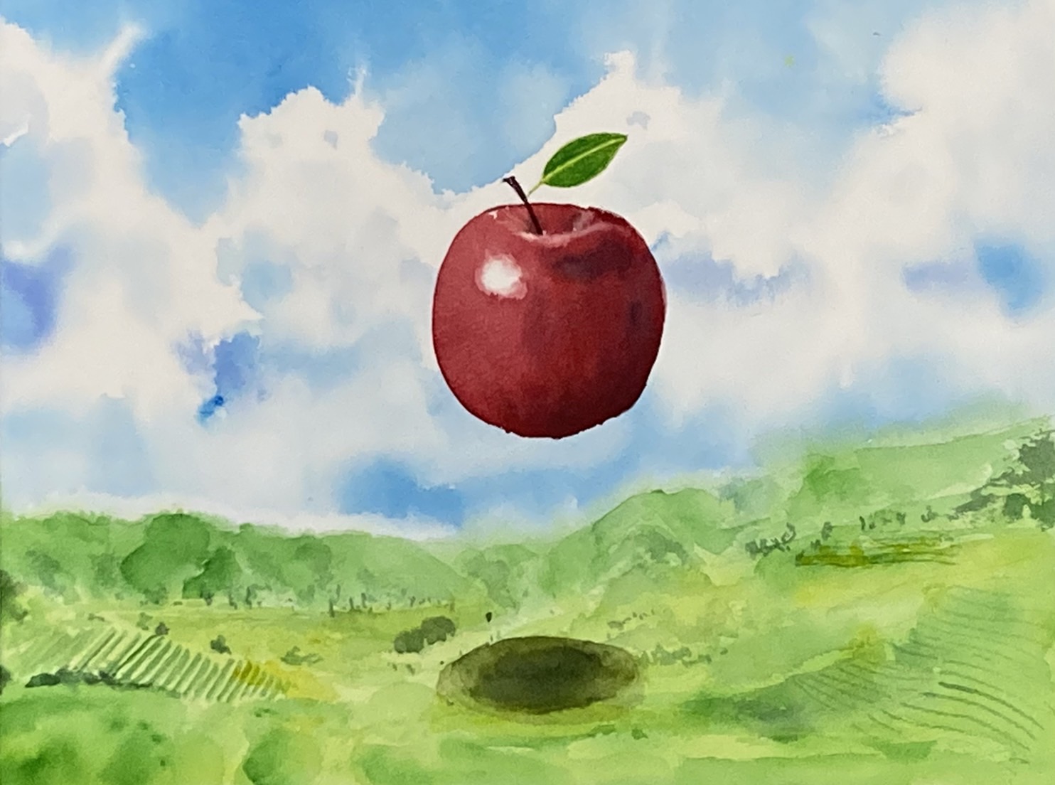 宙に浮くリンゴ 